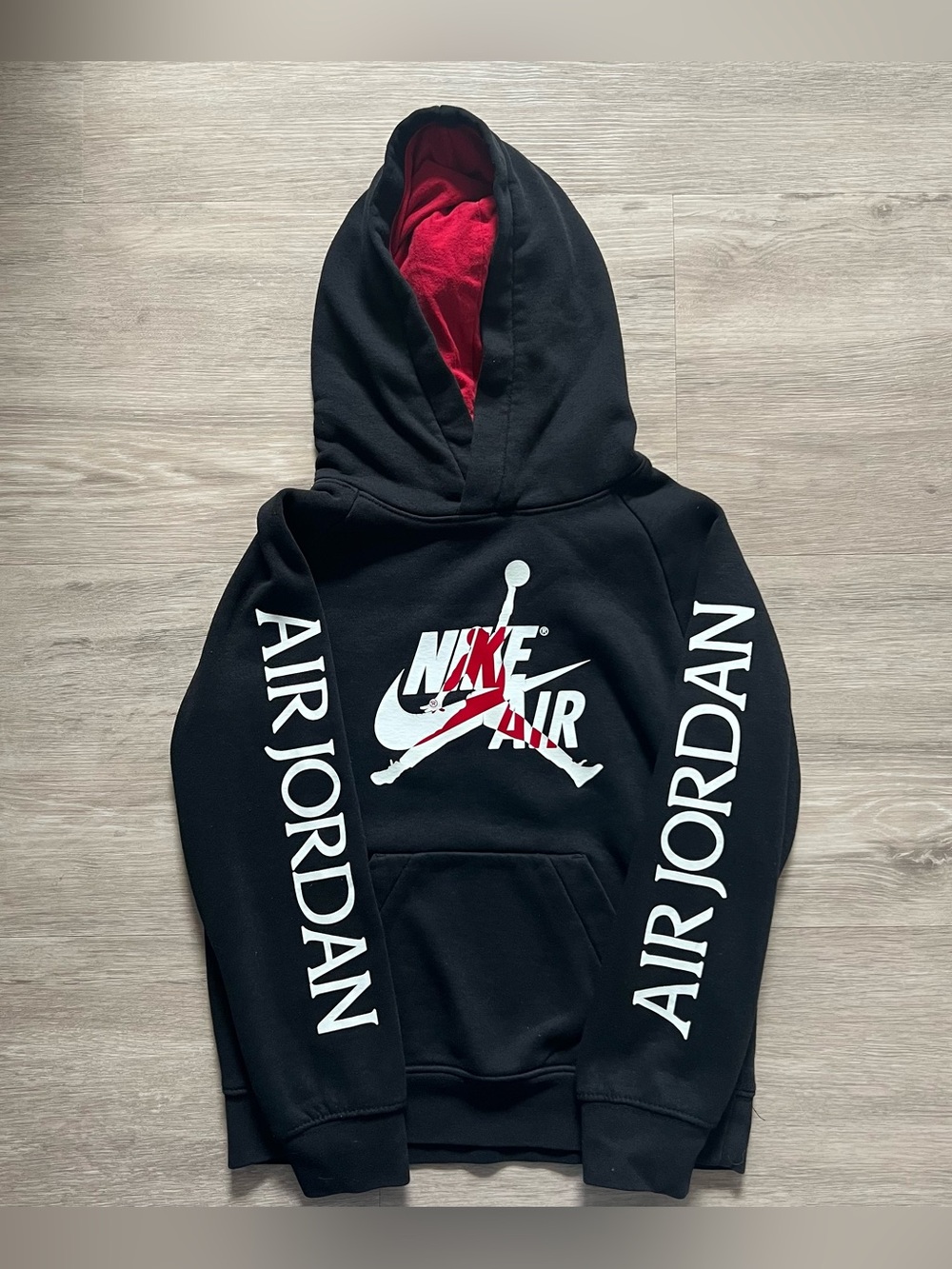 Nike Air Jordan Kids Black Pullover Hoodie with Red Lining